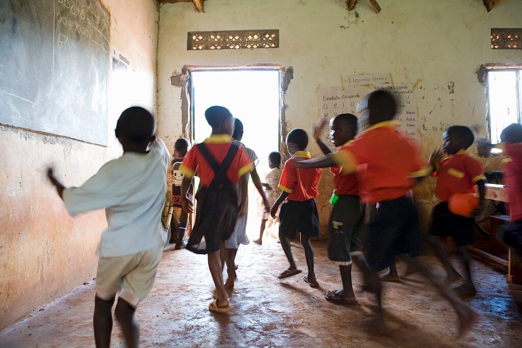 A classroom of orphan and vulnerable kids in Uganda.