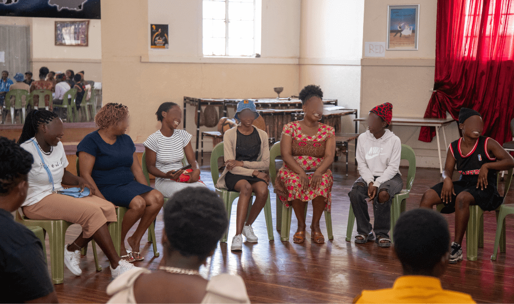 Survivors in our programming and staff in Zimbawe during a recent celebration